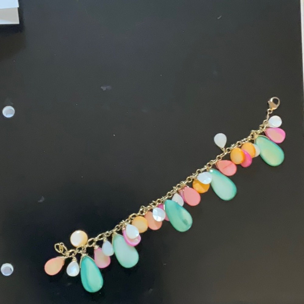 Cute gold bracelet with multiple colored stones
